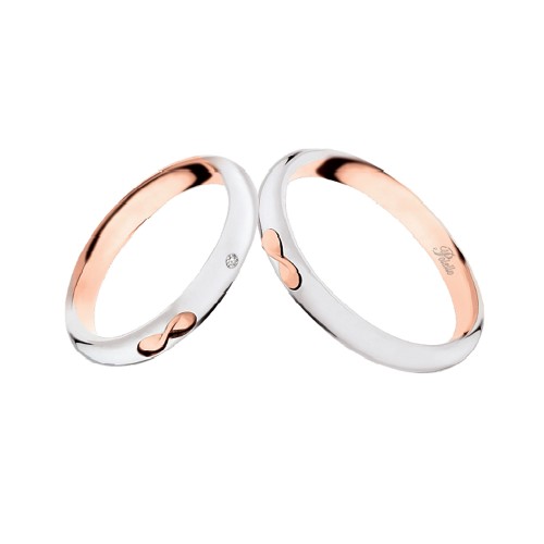 Coppia di fedi matrimoniali in oro bianco e rosa 18 Kt con diamante Polello